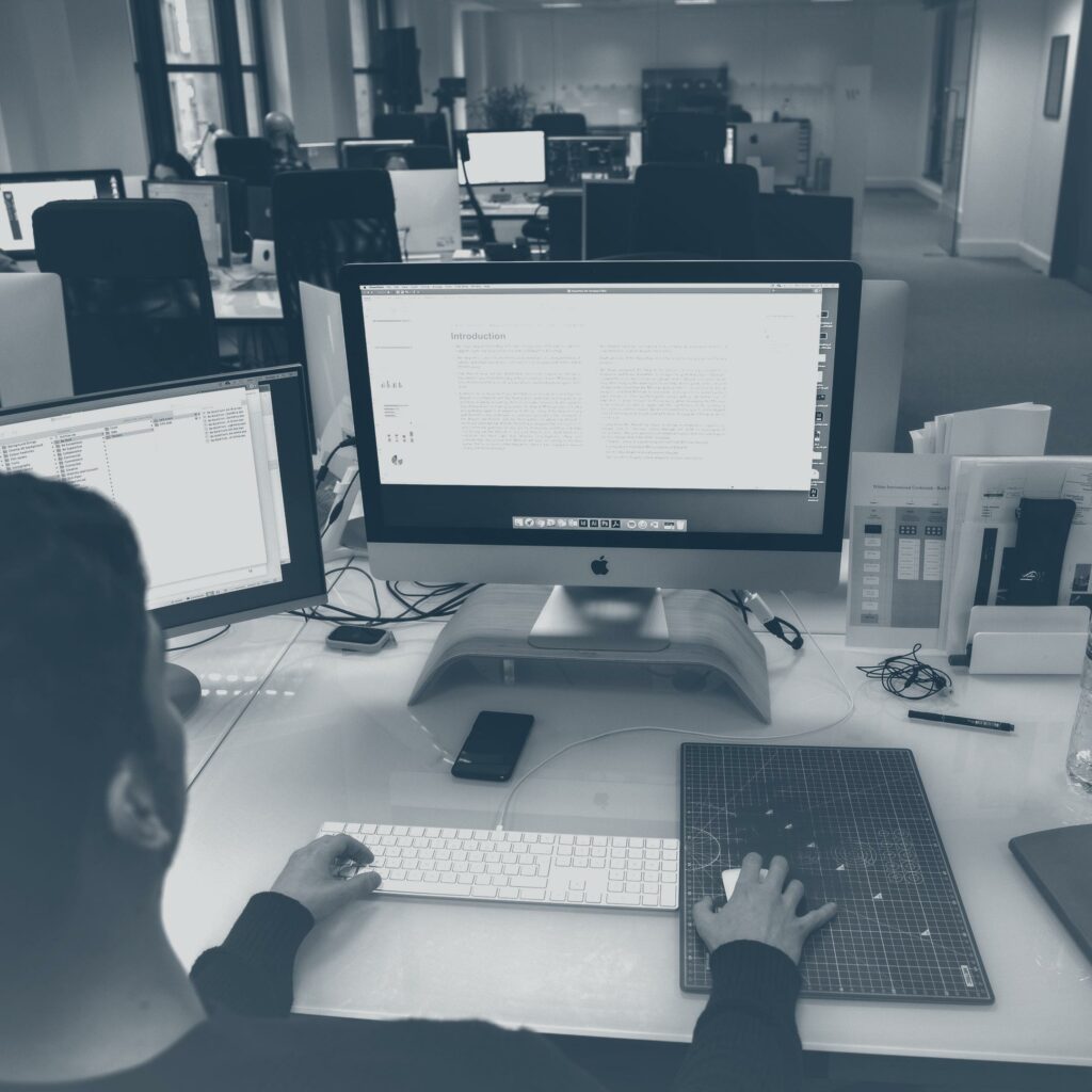 Photograph of Tolley Moloney working on a computer in the Within International London studio.